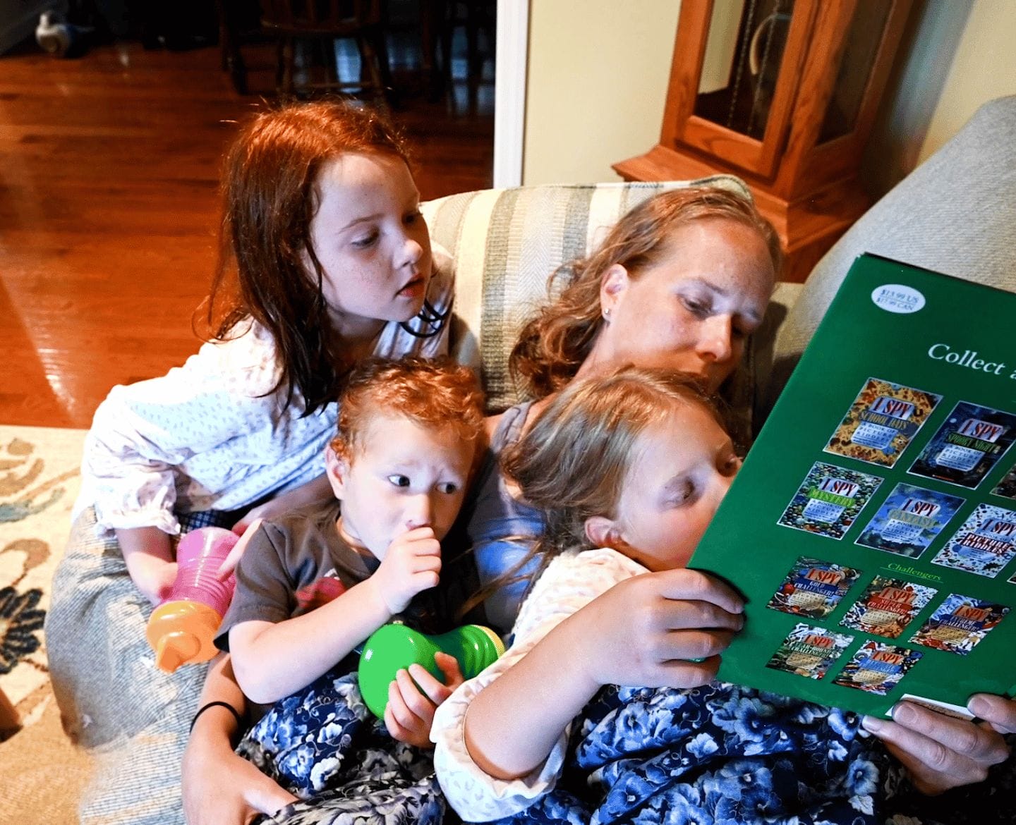 Mom reading to kids