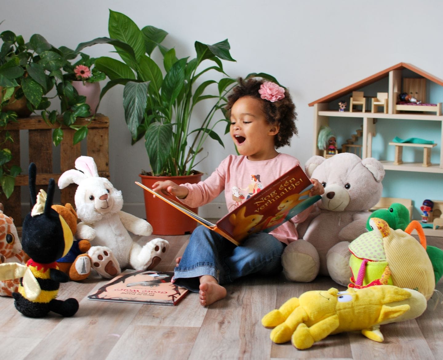 16 Books for three-year-olds to add to your toddler’s bookshelf little girl reading - books for 3 year olds