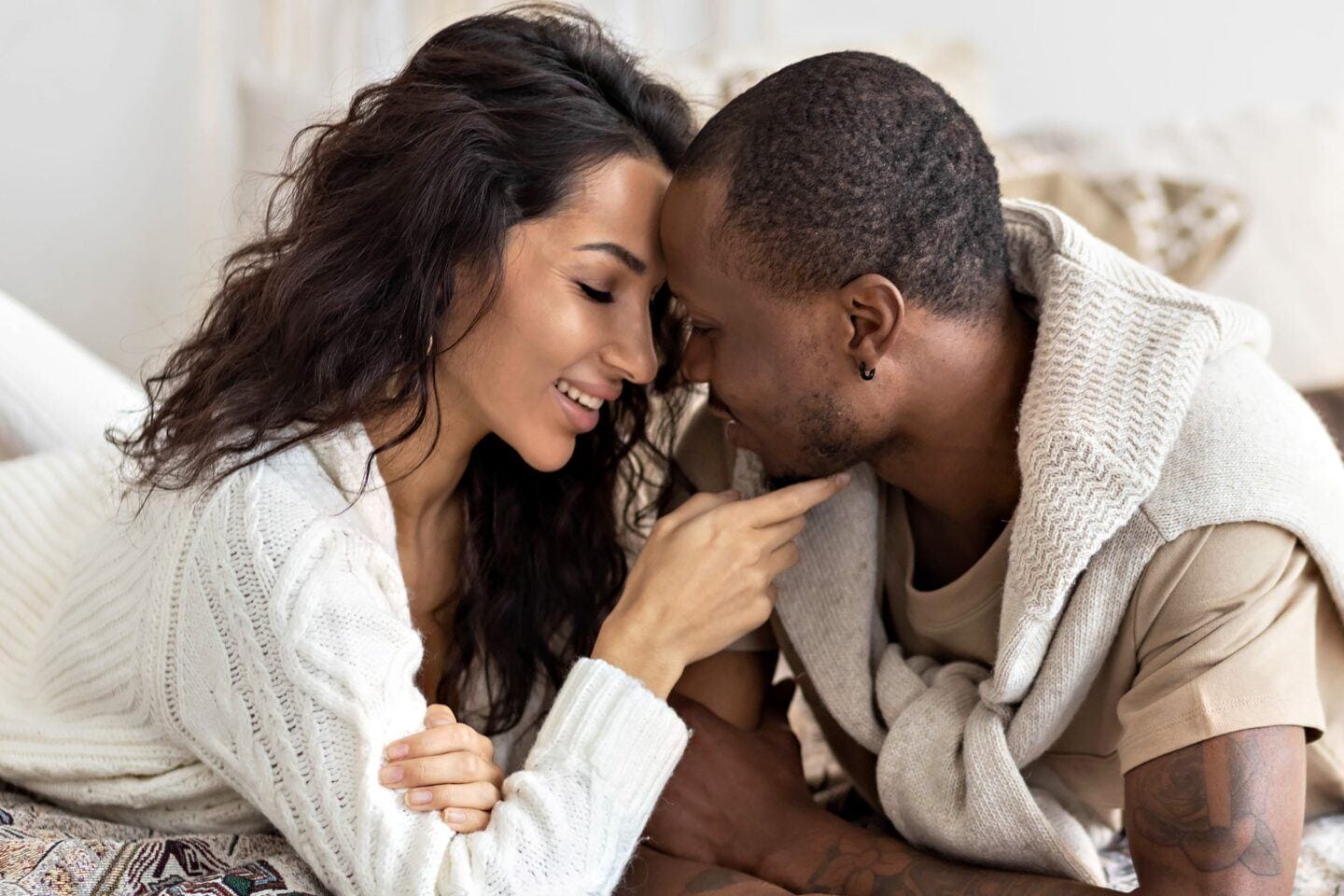 Which birth control is the best at preventing pregnancy? couple in love in bed - best birth control options