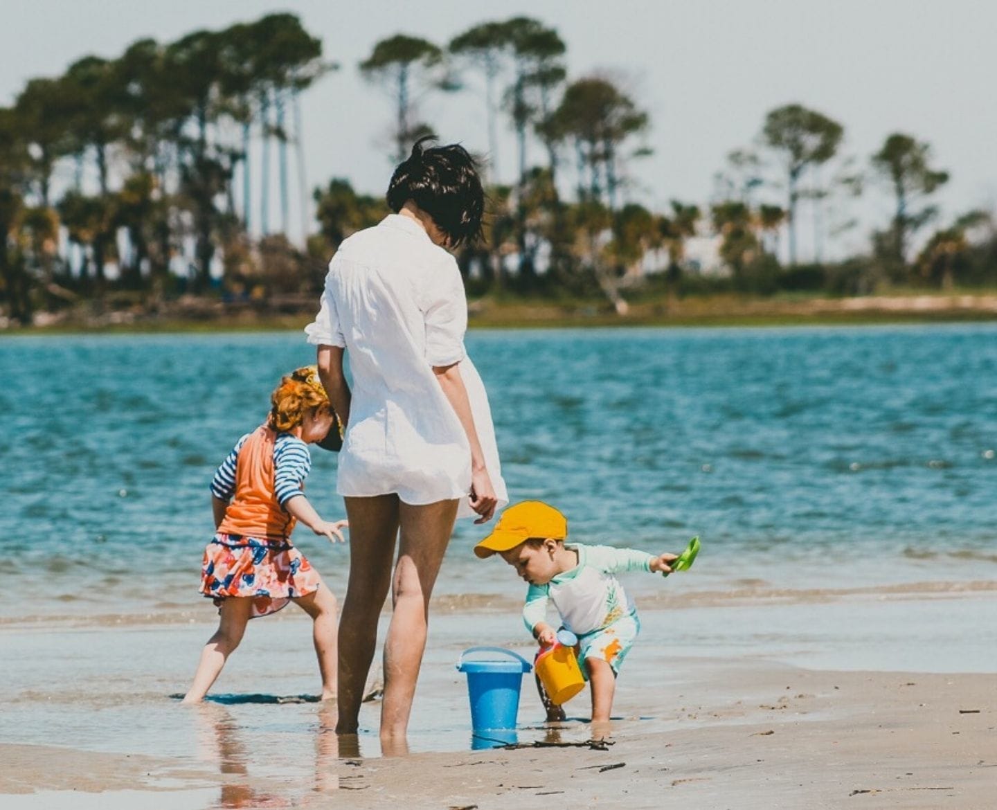 Please don’t tell me ‘we only have 18 summers’ 18 summers: mom at beach with kids