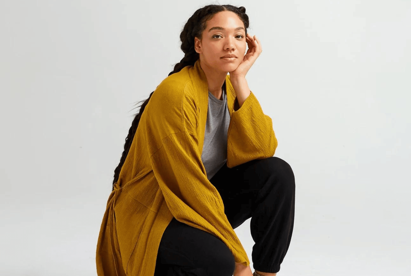 10 everyday wardrobe staples you need from the too-good-to-be-true Richer Poorer Warehouse Sale woman crouching