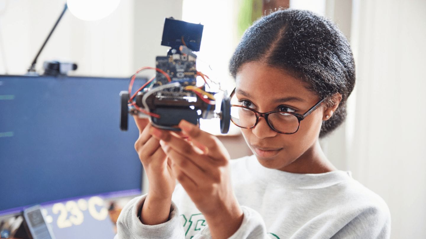 How to get kids to love science, according to Neil deGrasse Tyson girl doing science
