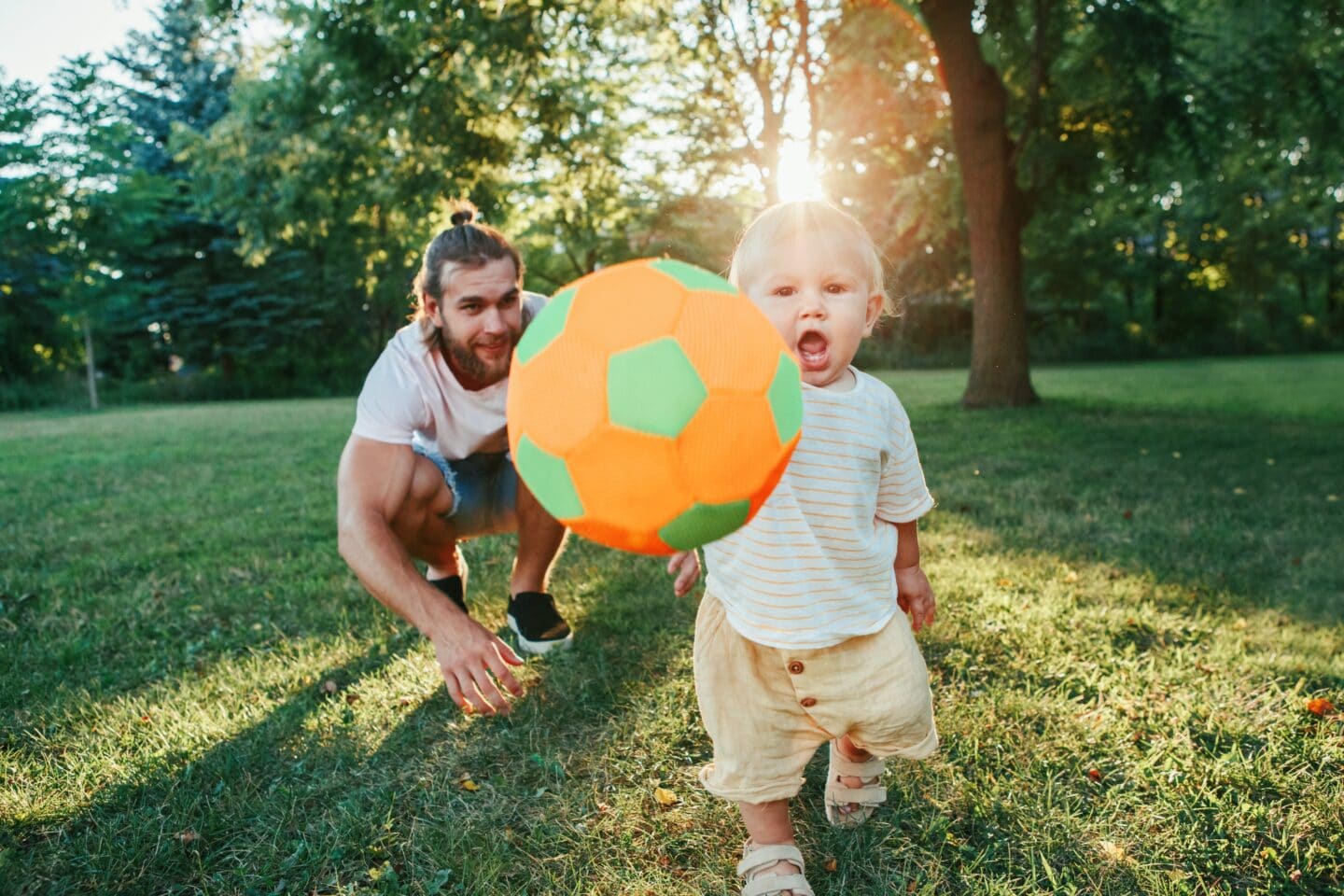 father baby child dad son toddler play ball outdoor active sport game soccer together fun young t20 Bm94aY - Motherly