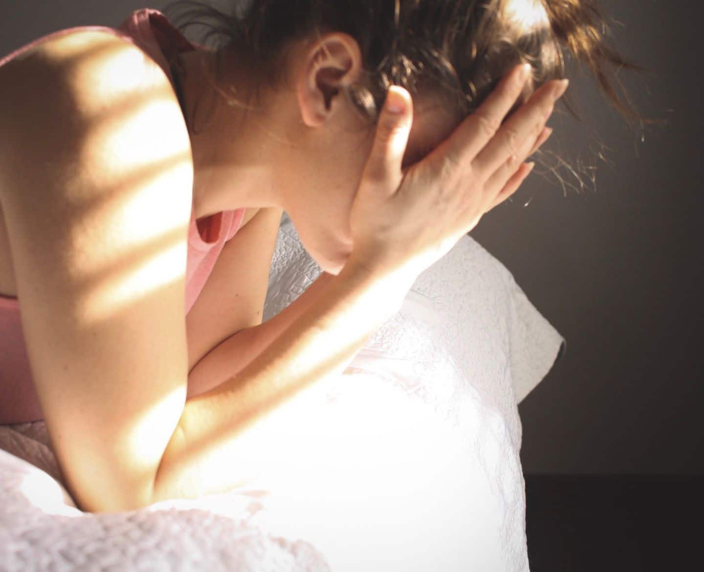 Overturning Roe v. Wade is about so much more than abortion upset woman head in hands