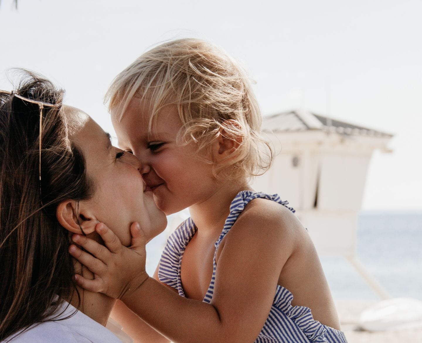 ‘Follow the child’: How a Montessori mantra changed my motherhood daughter kissing mom on beach