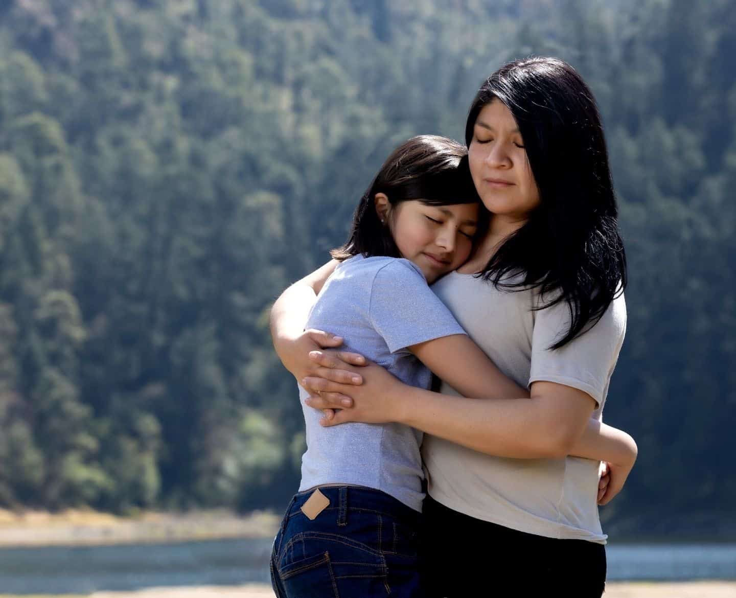 After Roe, a pediatrician shares how the health of America’s teens are at risk mother hugging teen daughter outside