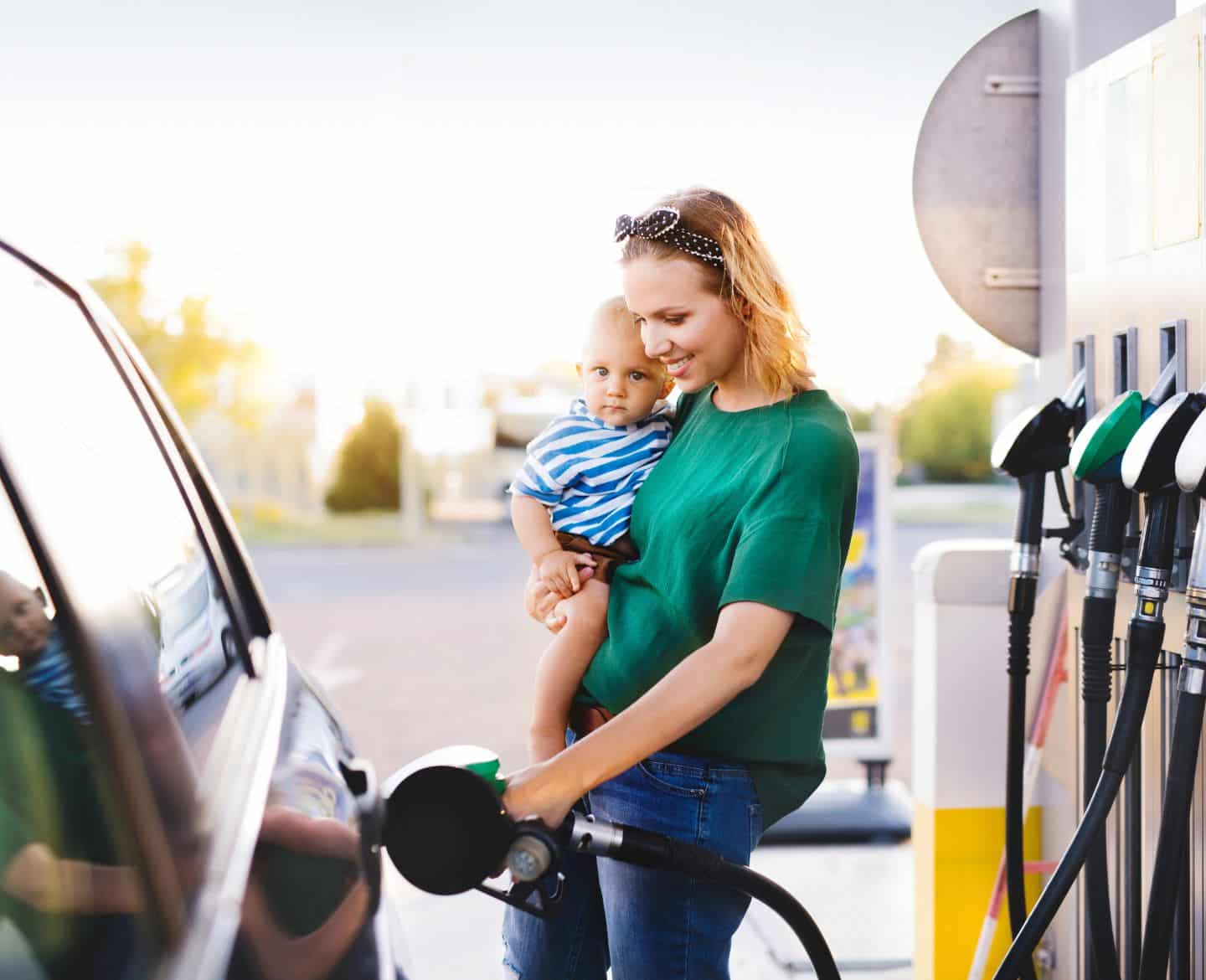 6 simple things you can do now to get better gas mileage woman and baby pump gas - how to get better gas mileage