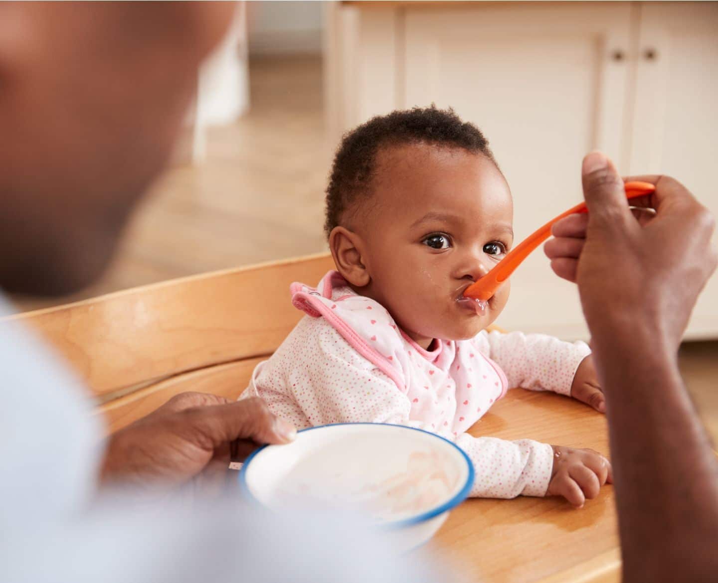 Heavy metal toxins abound in homemade baby food, too, report finds dad feeding a baby homemade purees