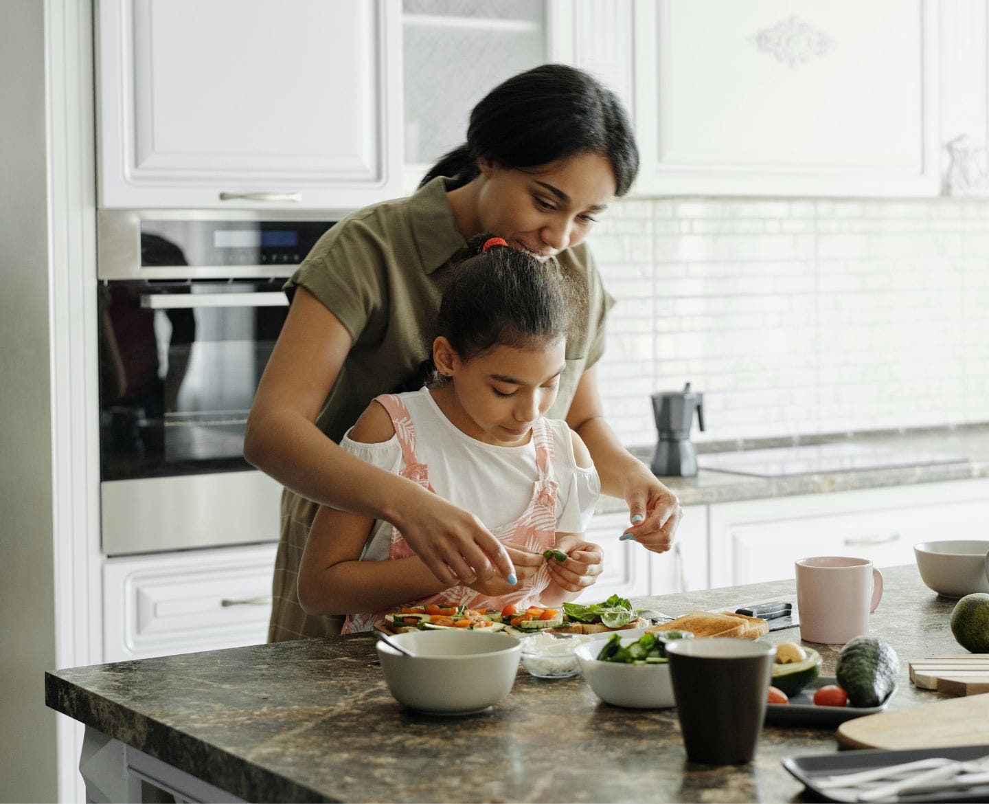 It’s time to stop feeling guilty about school lunches mother daughter cooking-school lunch