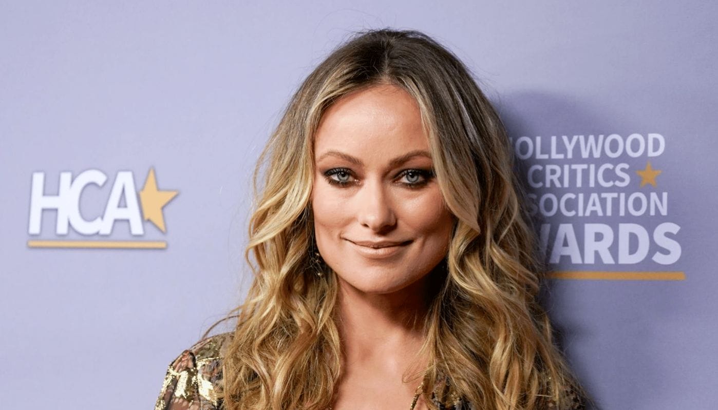 Olivia Wilde says she’s mom-shamed when she’s not with her kids: ‘I’ve never seen anyone say that about a guy’ olivia wilde red carpet