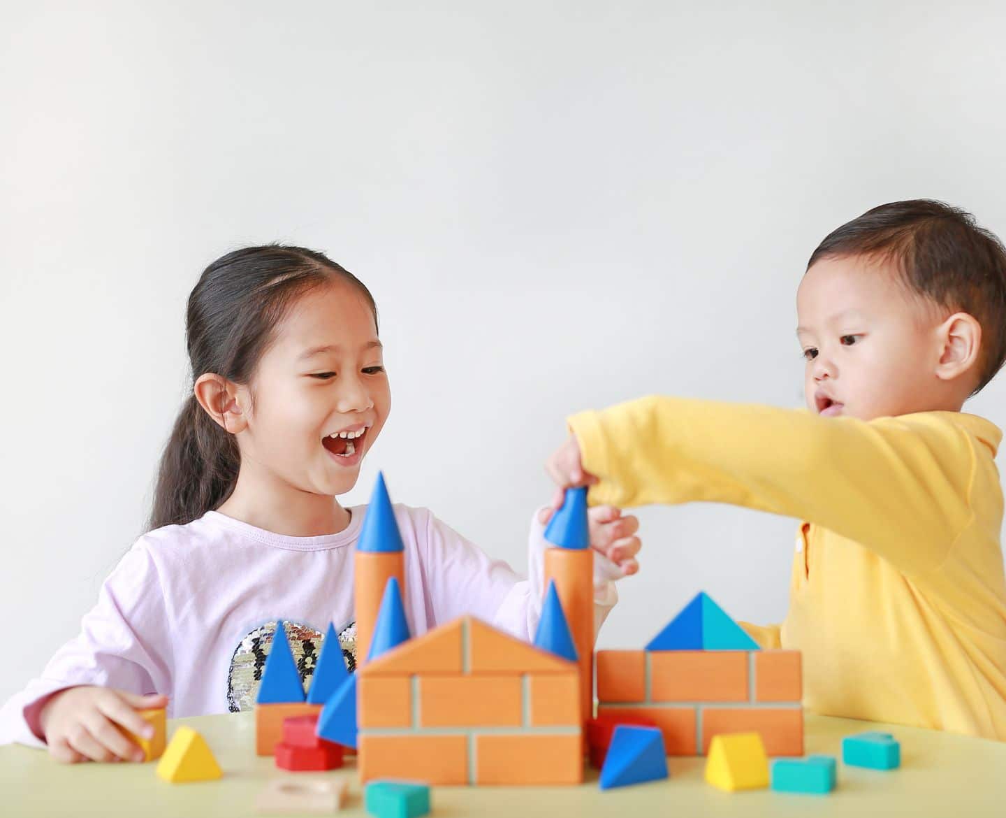 I was tired of hearing my girl is creative and my boy is destined to be an engineer two kids building a castle together - creative play