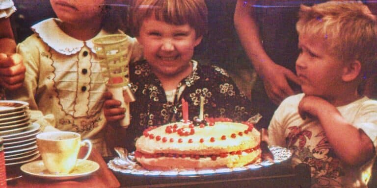 Can we bring back old school birthday parties, please? child smiling at simple birthday party