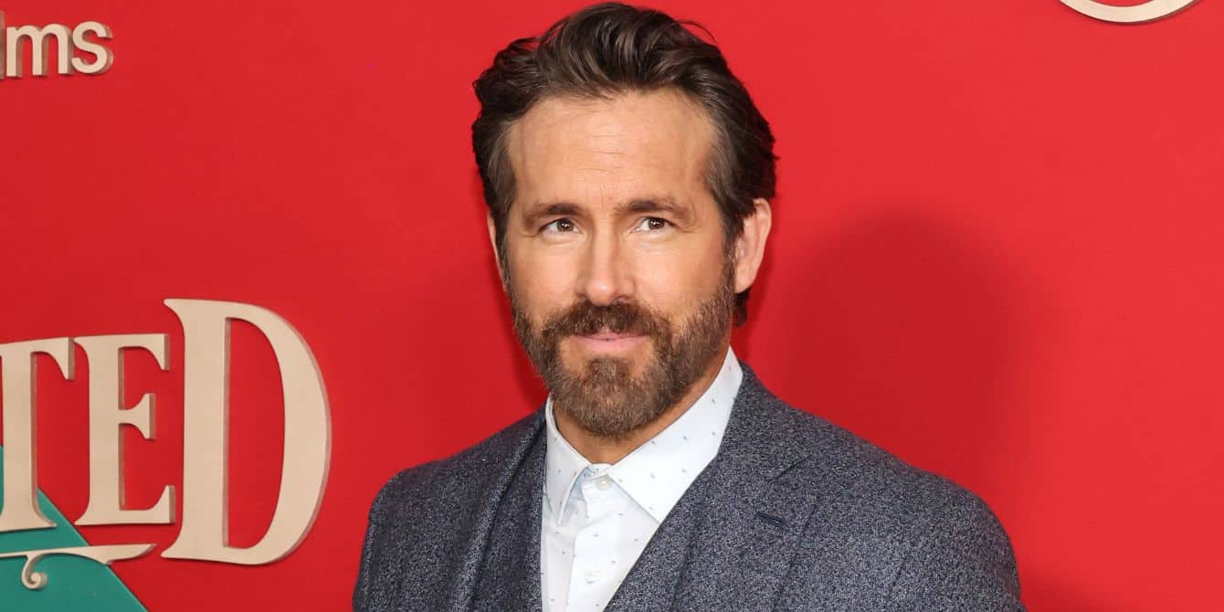 Ryan Reynolds says his daughters subscribe to the ‘religion’ of Taylor Swift—and SAME Ryan Reynolds posing on the red carpet for 'Spirited' Nov. 2022