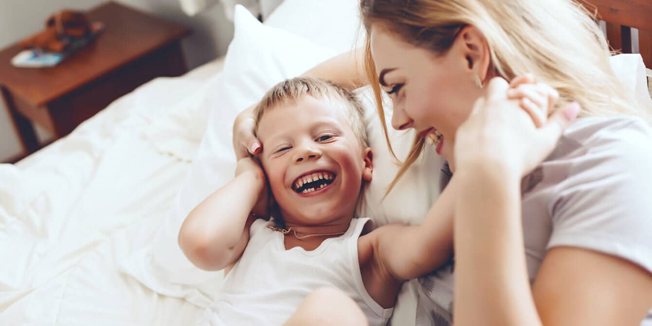 Working on my mental health as a parent mom working on mental health making son laugh in bed