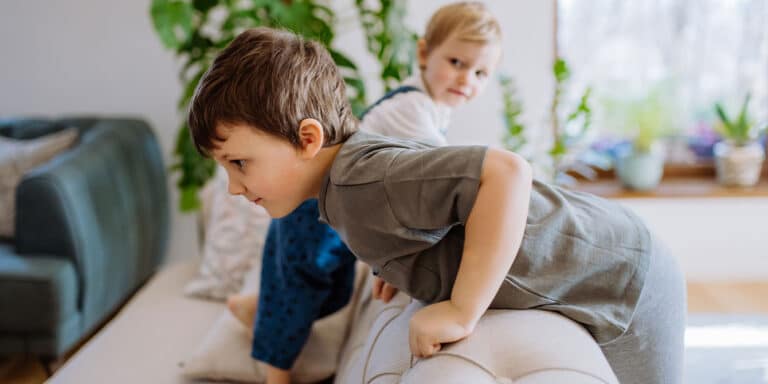 What’s it like being a ‘boy mom’? All the things I wish I had known boys playing on couch - life of being a boy mom