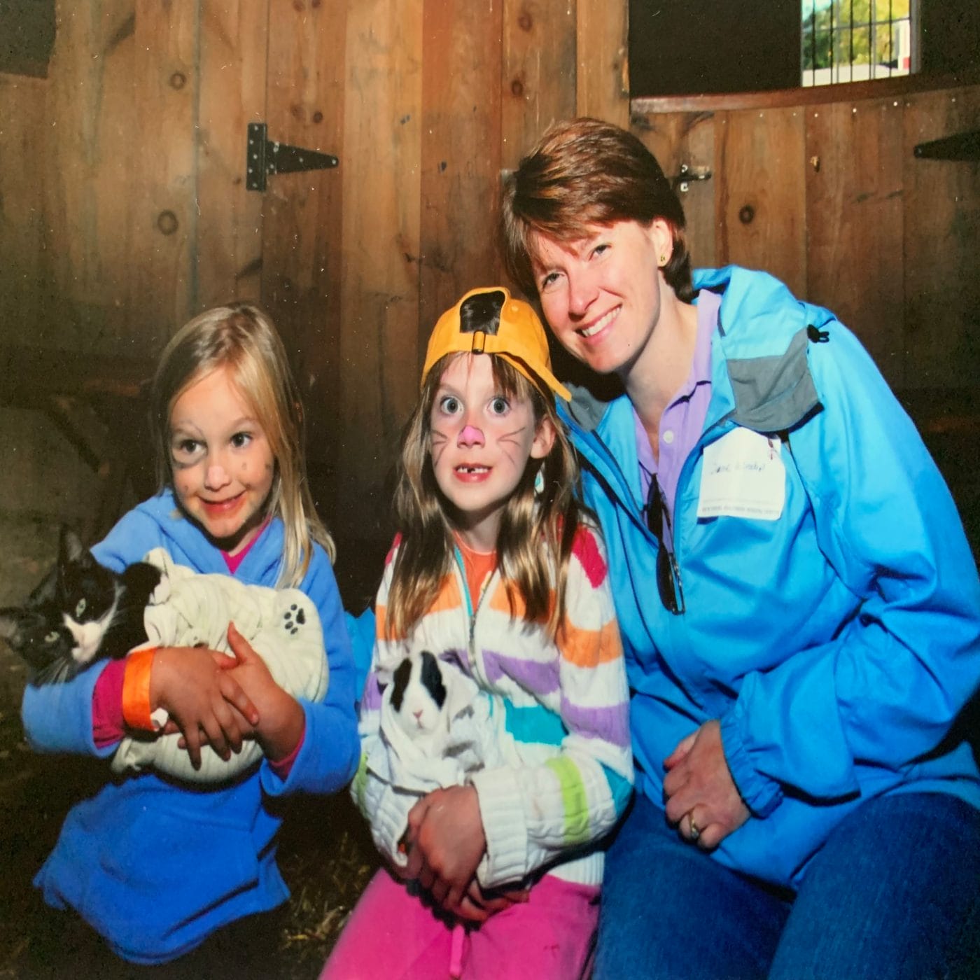 To my mom, who is about to become an empty-nester: thank you little girls holding animals with mom