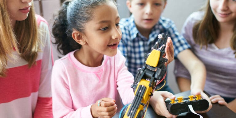 7 easy ways to introduce STEM education to your kids kids in experimenting with robots - how to introduce STEM education