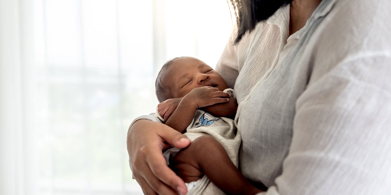 I was a struggling new mom—until I remembered this Navy organizational hack mom learning how to stay organized with a newborn at home