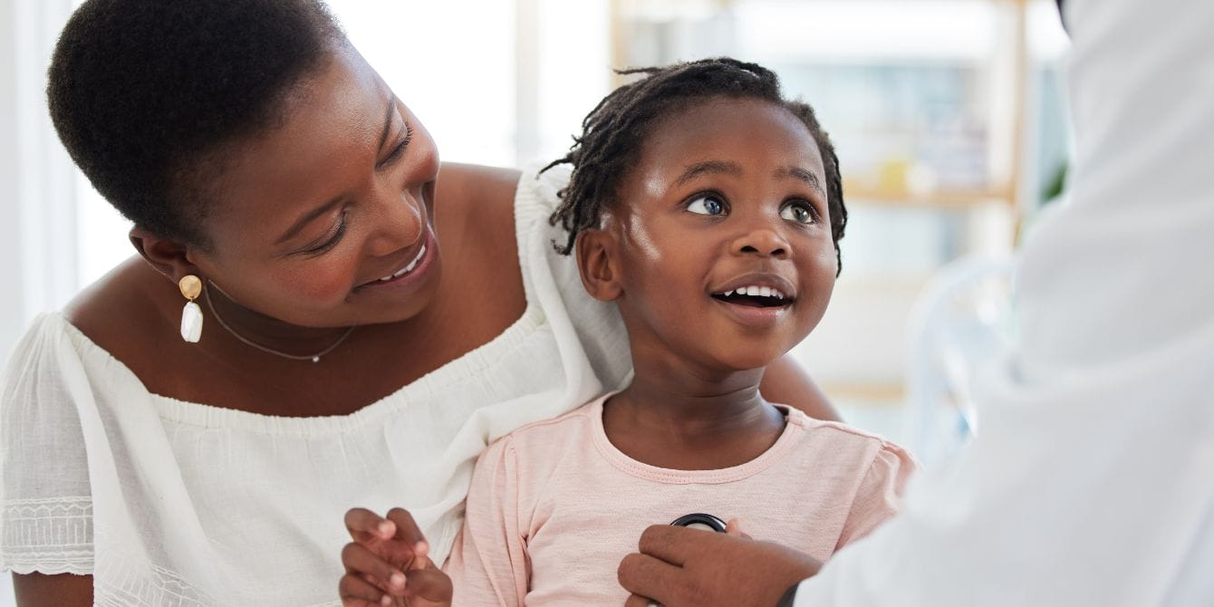 Looking for the best hospital near you? Start your search here Mom holding toddler during doctor visit - best hospitals