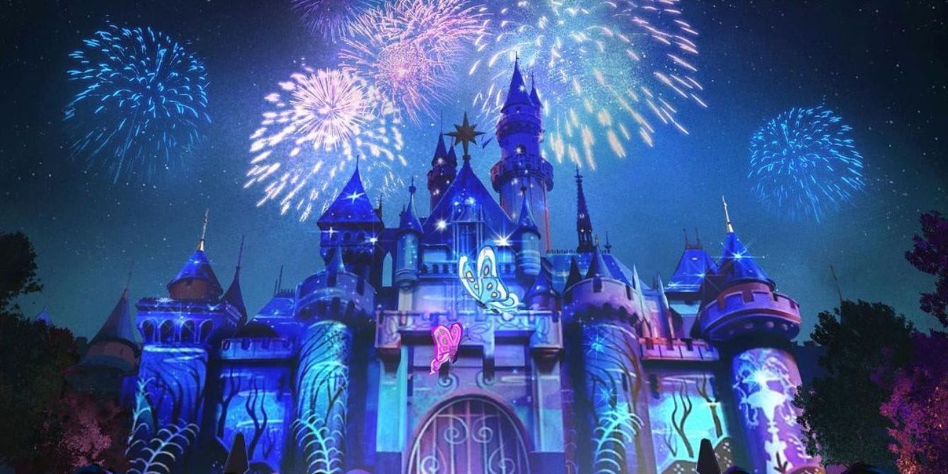 Disneyland shares big changes for 2023—including lower ticket prices cinderella's castle at disneyland with fireworks- disney 100