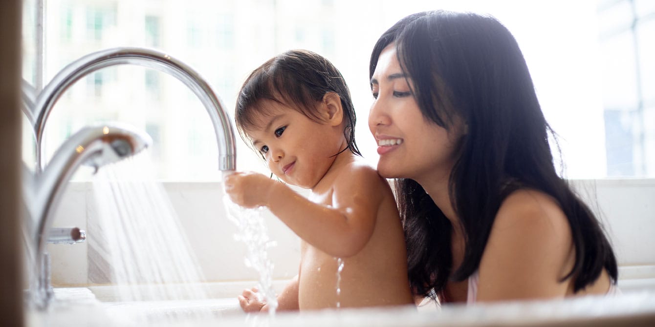 4 mental health tips for AAPI moms mom and baby taking bath together - aapi moms