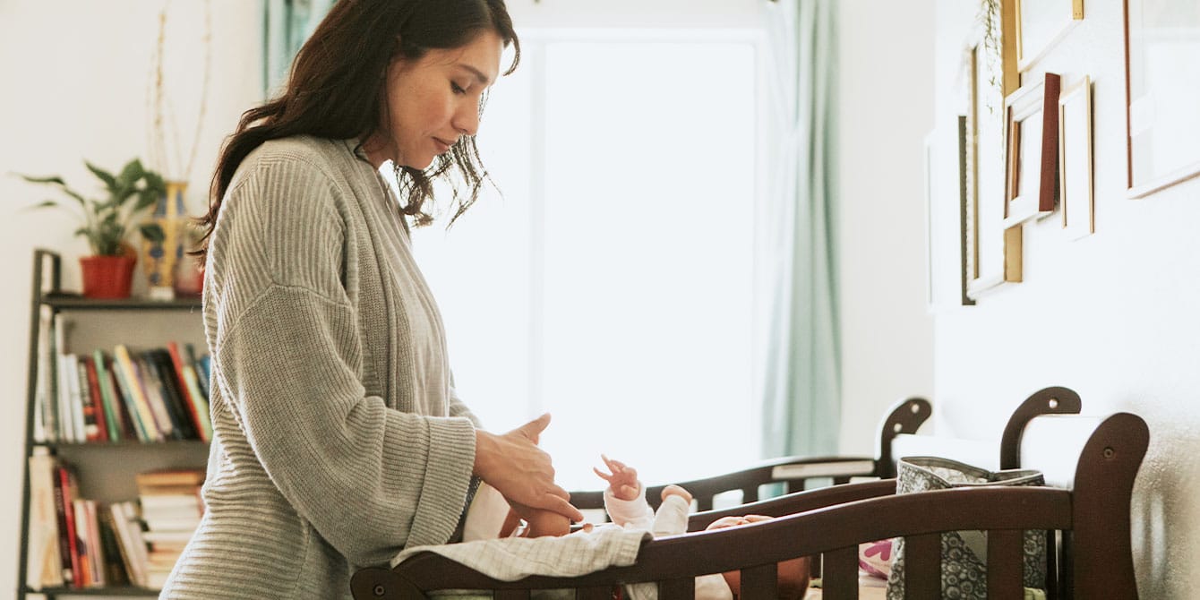 3 things your doctor might not tell you about postpartum mom changing baby's diaper at home - best postpartum advice for new moms