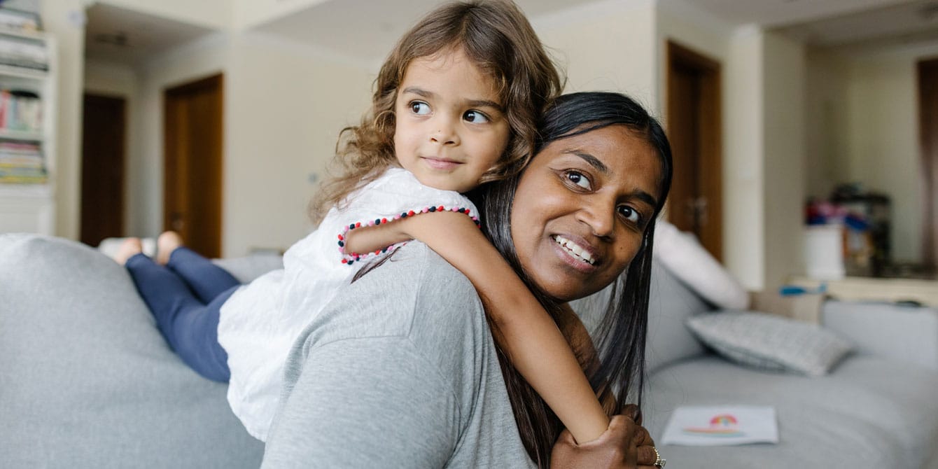 3 ways highly sensitive parents are making the world a better place mother and daughter playing on the couch - highly sensitive parent