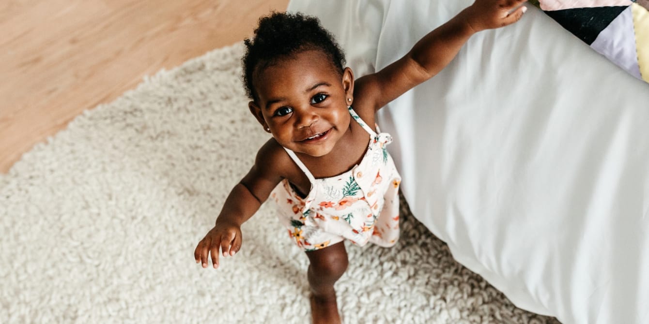 Activities for a 12-month-old: Fostering baby’s development 12-month-old baby learning to walk - activities for 12-month-old