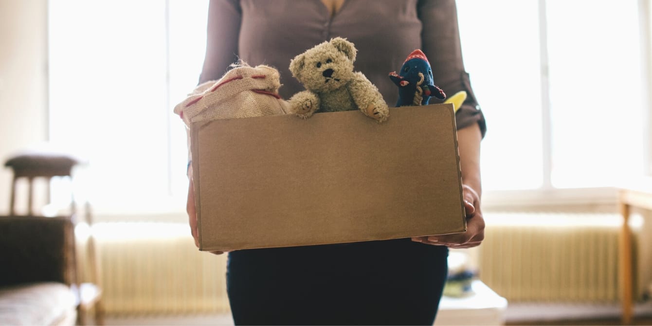 Reddit thread offers best options for donating toys so they’ll get used again: ‘Such awesome suggestions’ person holding cardboard box of toy donations