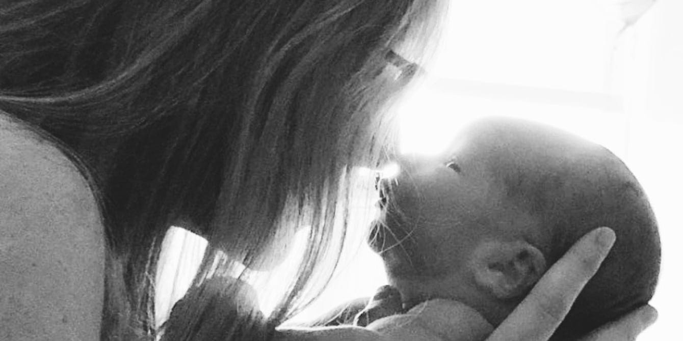 I waited for you infertility poem mom kissing baby