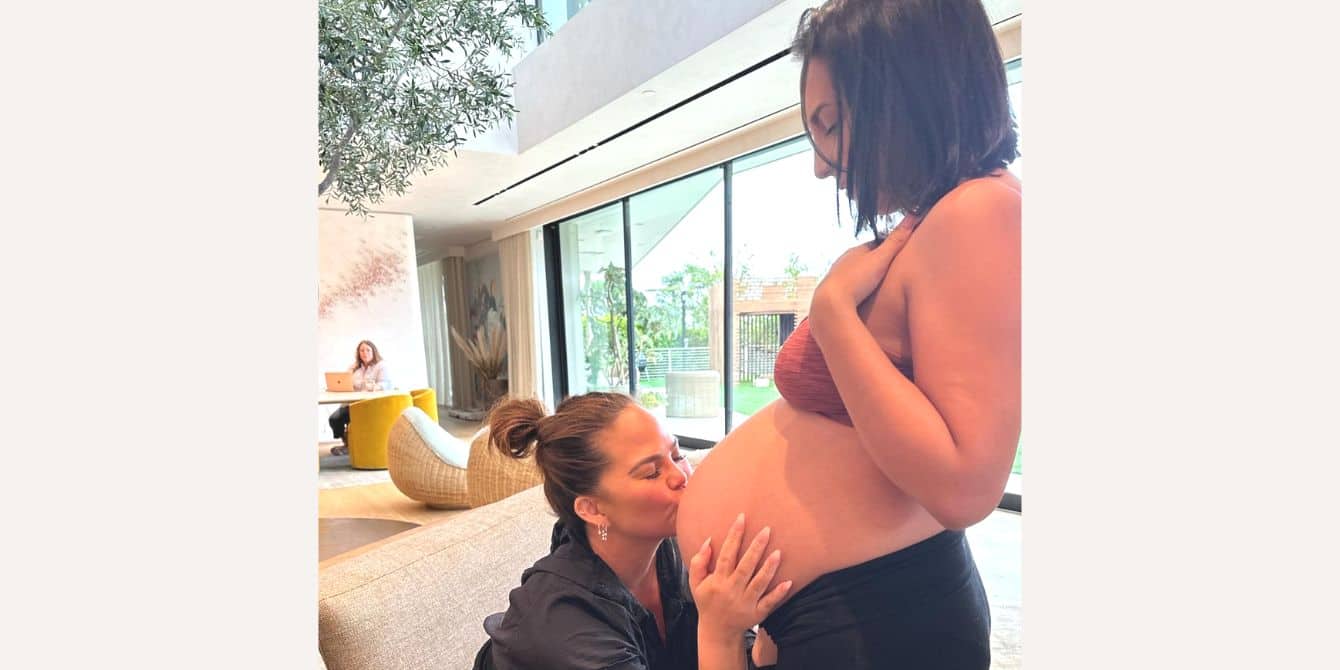Chrissy Teigen’s surrogate speaks out after giving birth to her baby boy Chrissy Teigen kisses her surrogate's belly