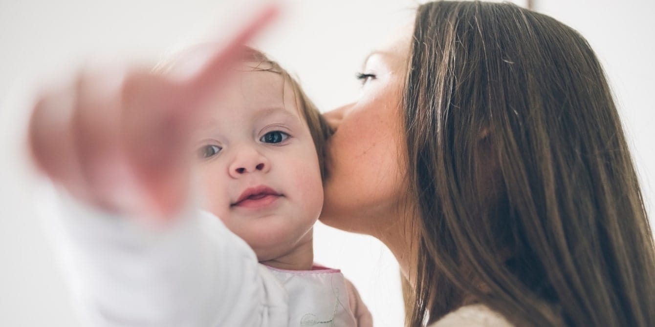 Is everyone else a better parent than me? mother hugging daughter - comparison trap in motherhood