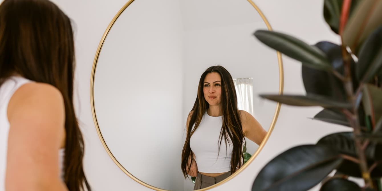 3 ways to reconnect with yourself in motherhood, according to a therapist a mother finding a way to reconnect with yourself during motherhood