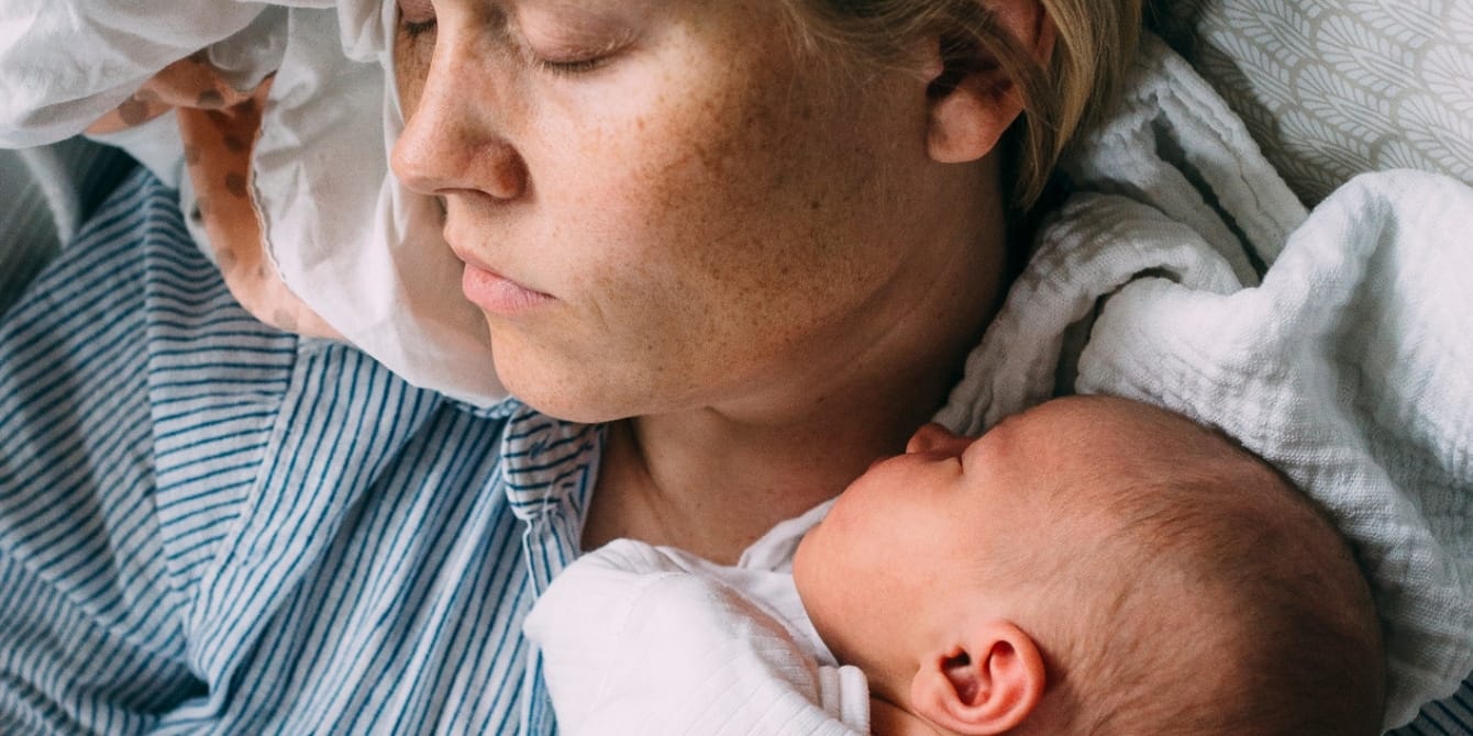Are you in the ‘messy middle’ of motherhood? Mom and newborn baby sleeping - Are you in the messy middle of motherhood?