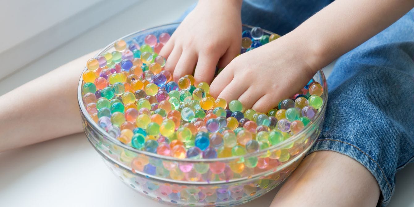 Water beads sold at Target recalled following death of 10-month-old baby Child playing with water beads