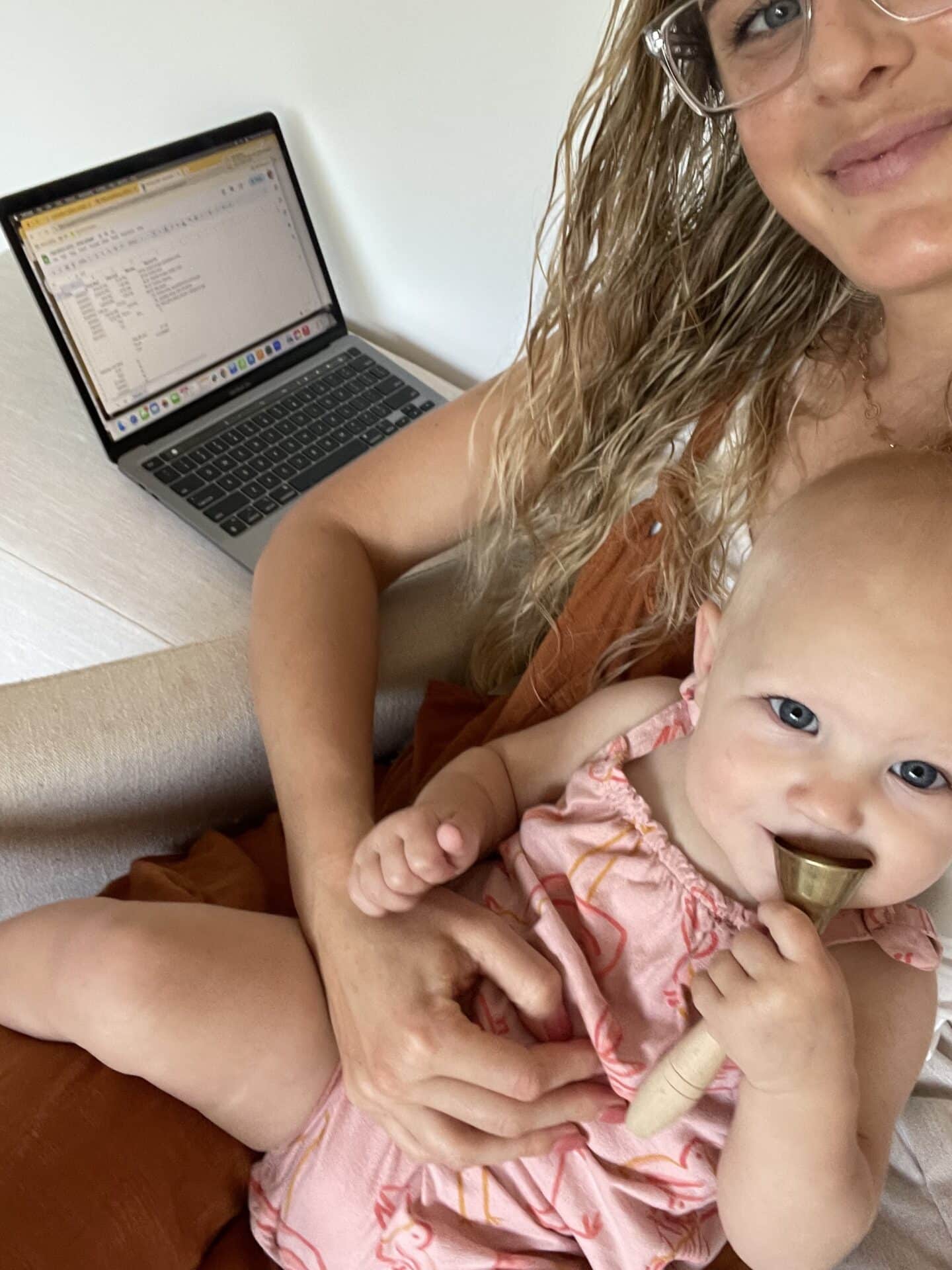 Caroline Stone Peters working at home with baby