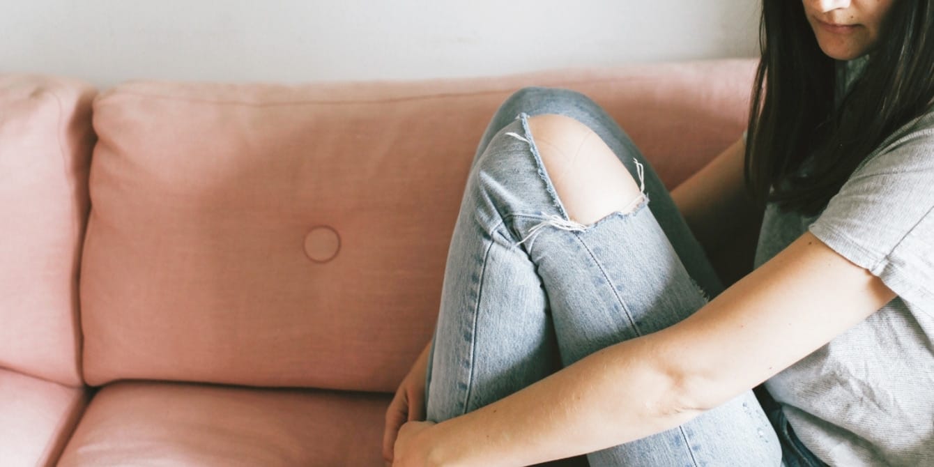 I just want to sit woman sitting on the couch- time to sit