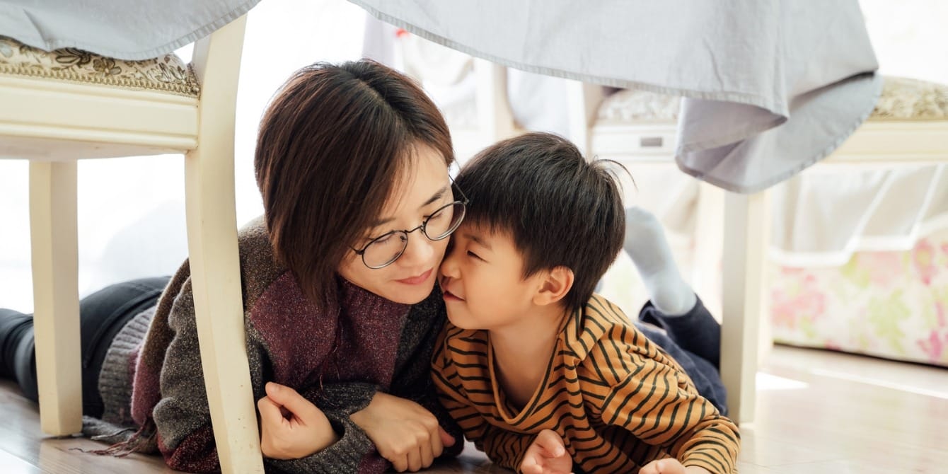 Creating a safe haven for your child: 5 simple, impactful ways to build a cozy home young boy serious mom together at home - how to create a safe space at home