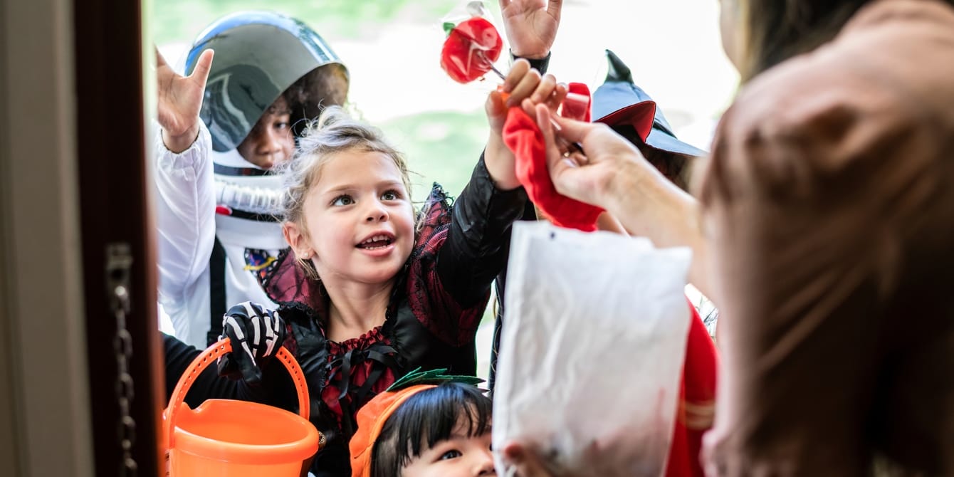 Study breaks down the Halloween candy with the scariest amount of sugar kids getting candy trick or treating Halloween candy with most sugar