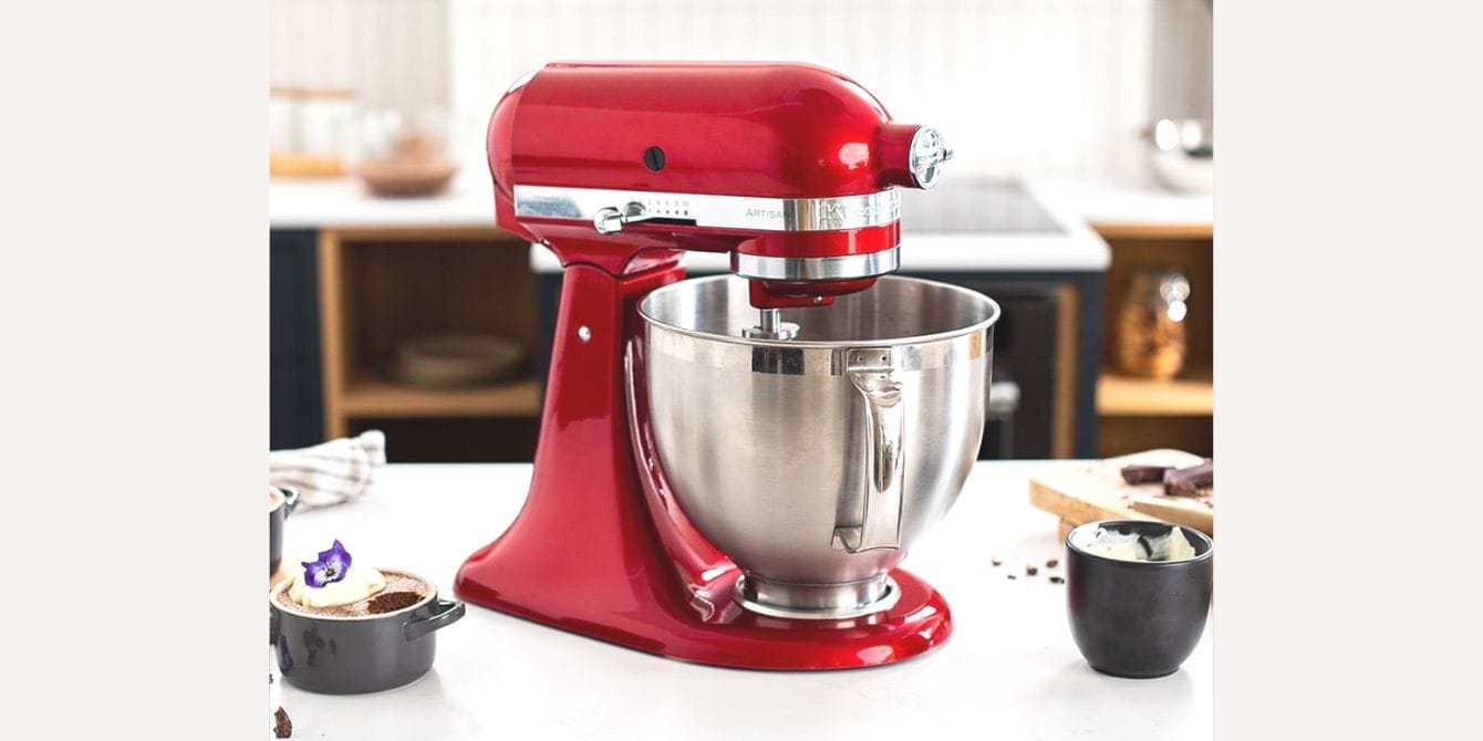 An ode to the KitchenAid mixer—and it’s on sale today! red kitchenaid mixer on top of a table
