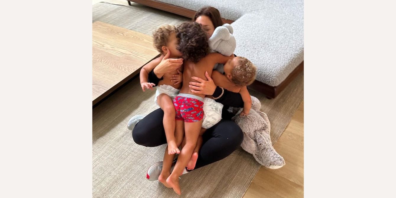 Ashley Graham says balancing parenthood and her career is ‘a constant struggle’ Ashley Graham hugs her sons