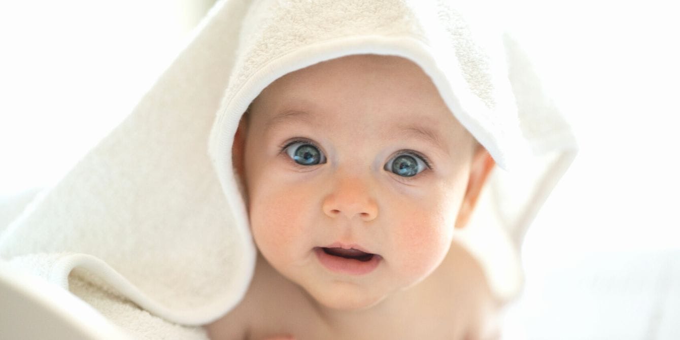 Dior launches a luxury skincare line for…babies?! Baby in bath towel
