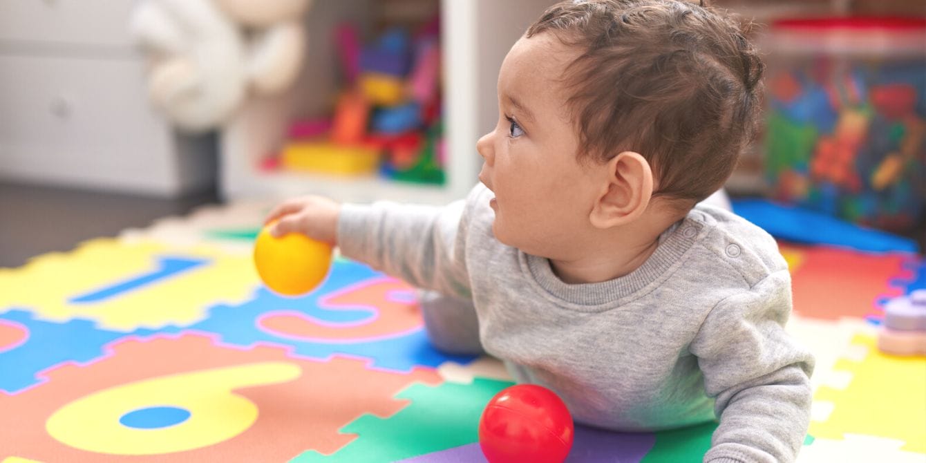 Biden asked Congress to fix the childcare crisis—with $16 billion in funding baby in daycare center