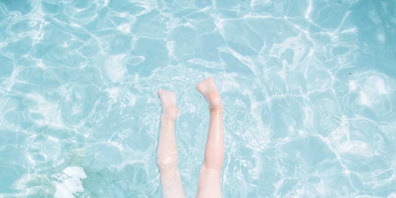 The silence of drowning child's legs in a swimming pool - drowning is silent