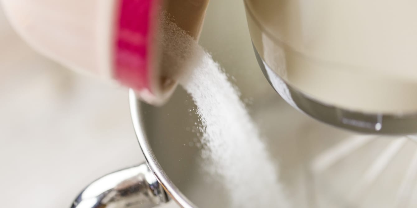 There’s a global sugar shortage—and yes, holiday baking could be affected sugar being poured into mixer worldwide sugar shortage