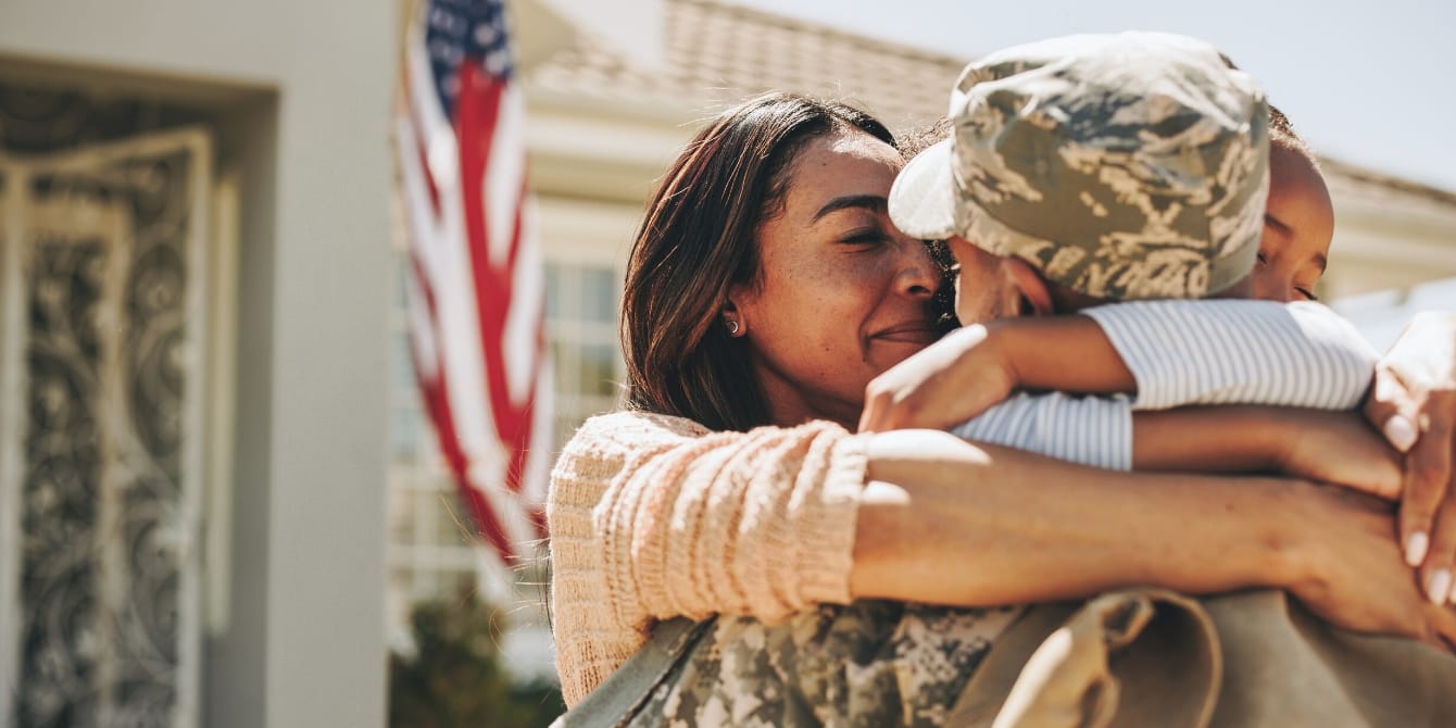 It’s time to talk about mental health for military spouses and children wife and child hugging military spouse