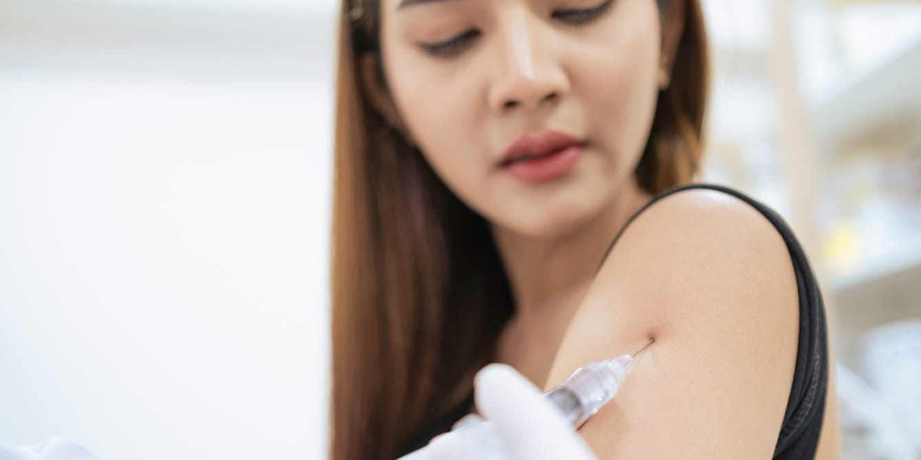 Covid vaccine doesn’t increase early miscarriage risk in men or women, study finds woman getting vaccine - covid vaccine early miscarriage risk