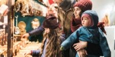 What holiday shopping can teach kids about personal finance family shopping at Christmas market teach kids about personal finance