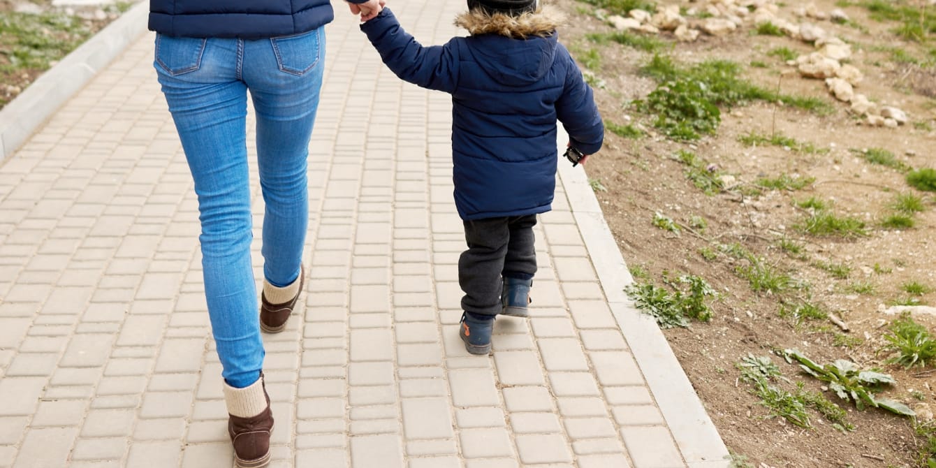 Snakes, elevators and a life-threatening illness—letting go of fear for the sake of my son mom and child walking outside- letting go of fear