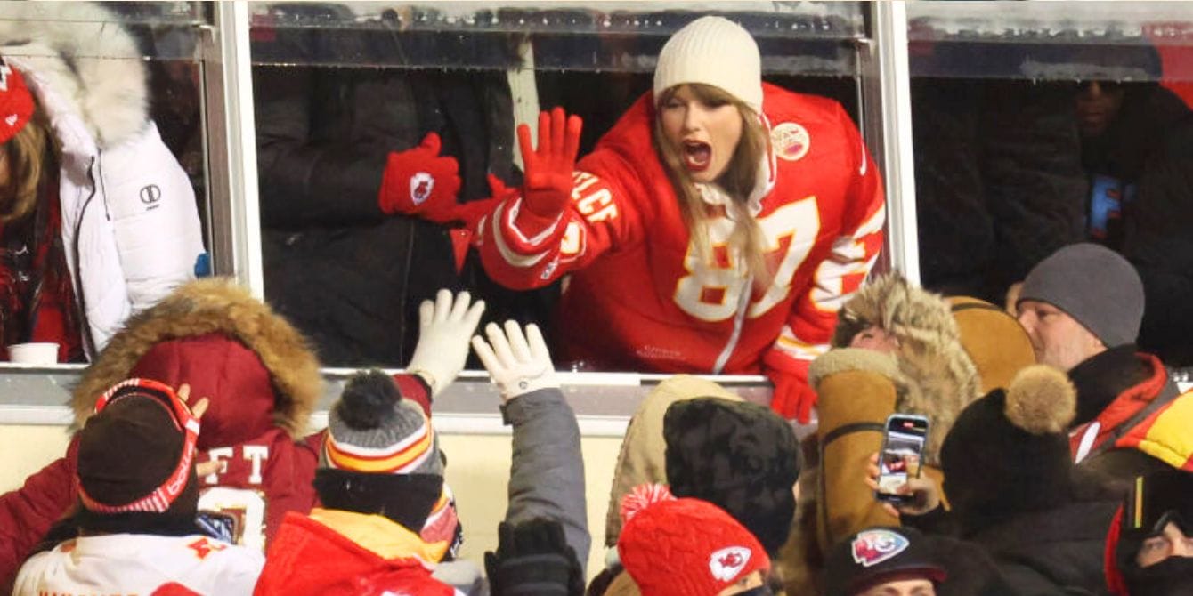 Dads are bonding with their daughters over the NFL thanks to the power of Taylor Swift Taylor Swift high-fiving fans at NFL game